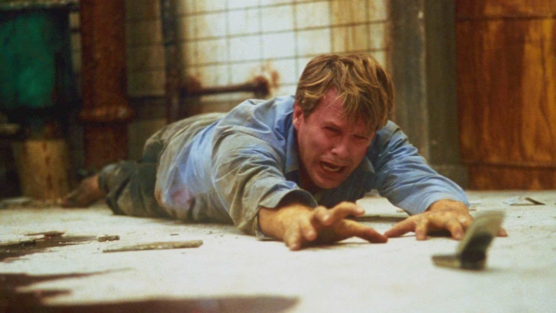 saw 2004 Making Sense of the SAW Series: The Entire SAW Franchise, Explained 11 saw 2004 saw franchise explained saw movie guide explained